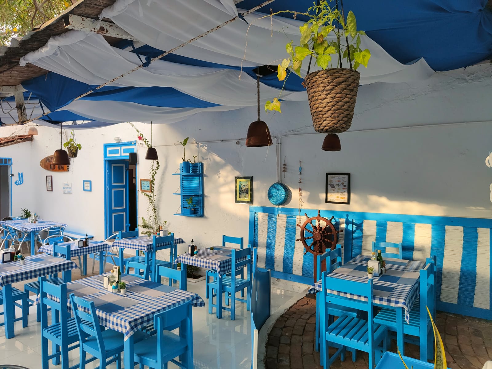 Outdoor seating area with blue and white decor
